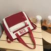 Schoolbag Japanese simple and fashionable backpack 1011 summer new middle school schoolbag college student college style alphabet backpack