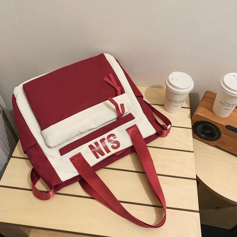 Schoolbag Japanese simple and fashionable backpack 1011 summer new middle school schoolbag college student college style alphabet backpack