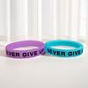 Five-Color Silicone Inspirational Bracelets - 'Never Give Up' - Available In Yellow, Pink, Blue, and Green.