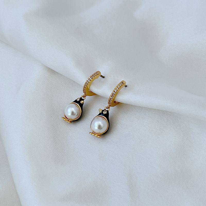 

Серьги-подвески в форме пингвина с инкрустацией жемчугом