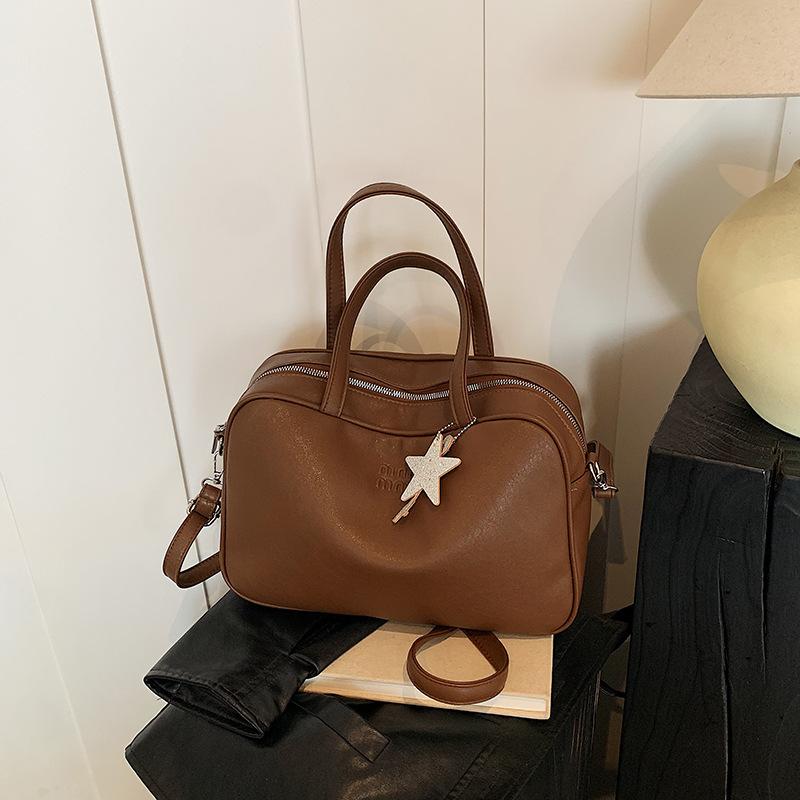 

Simple hand carry retro fashion portable commuter bag new niche high-end pillow bag large-capacity women s bag