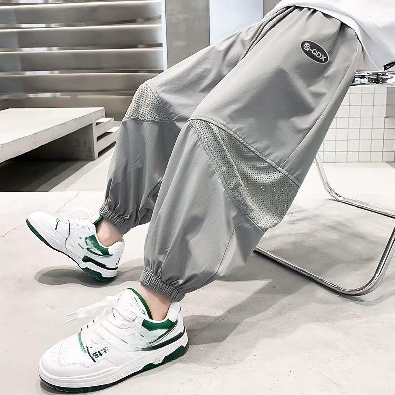 

Детские брюки от комаров Летние брюки с завязками на ногах Брюки-сокровище Сетчатые дышащие вставки Модные и трендовые брюки Повседневные брюки 150 серый