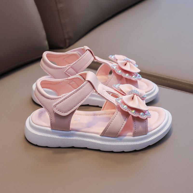 

Босоножки для девочек 2025 лето новые нескользящая мягкая подошва липучка модный бант яркий бриллиант девочки пляжная обувь прилив Recommended foot length = inner length + 1cm розовый