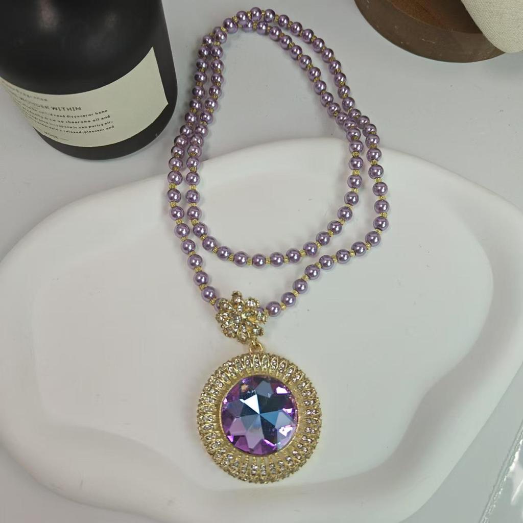 Purple Pearl Long Necklace for Women: Luxurious Fall/Winter Accessory for Sweaters, Cheongsams, and More.