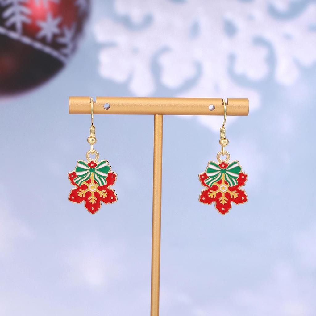 Festive Reindeer & Gingerbread Earrings: Christmas Cartoon Drip Oil Design