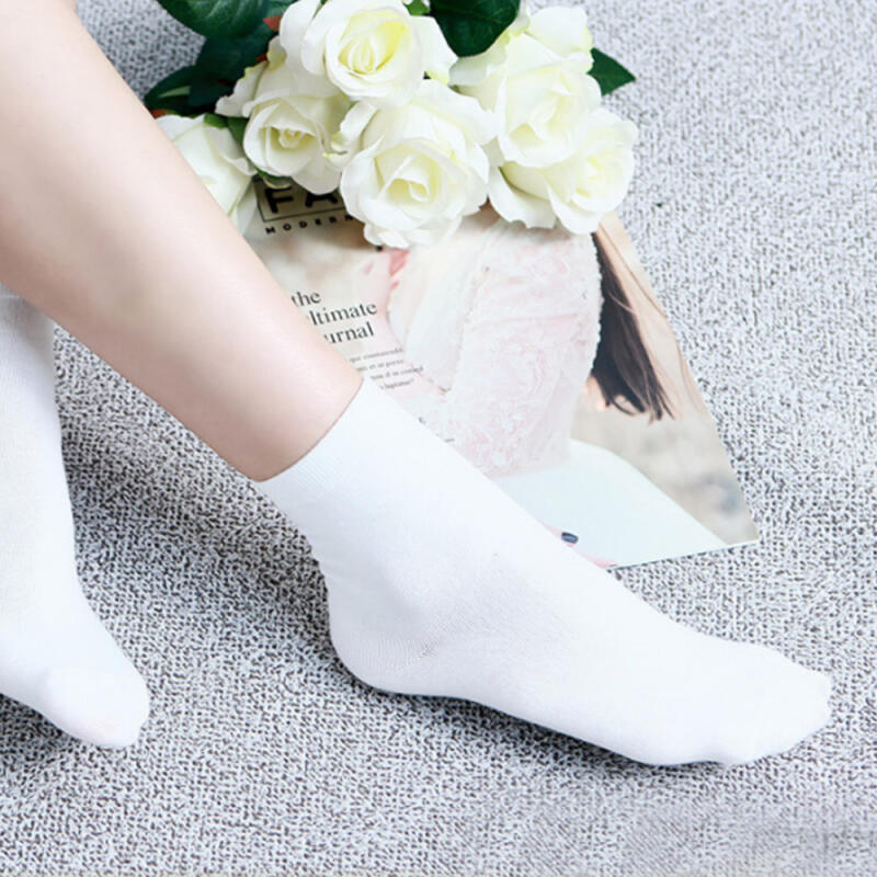 

23 pairs of domestically produced women s neat mid-calf socks, all-season socks 1 pair of white