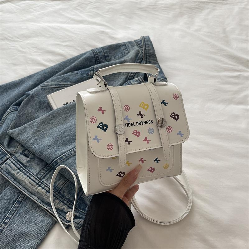 

Women s bag 2025 new Korean version of versatile college style handbag simple casual double shoulder small square bag single shoulder messenger bag
