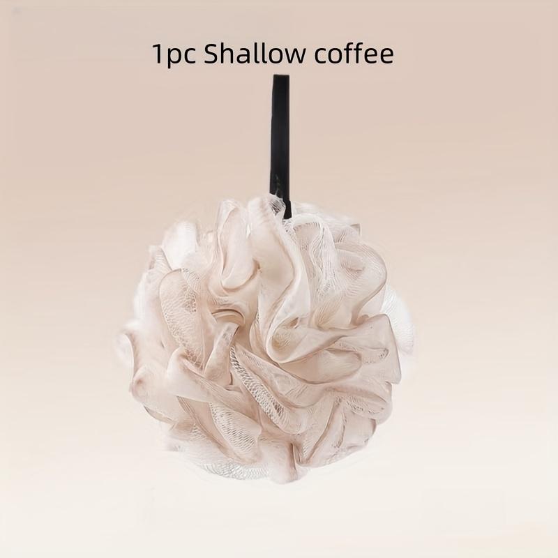 

A gradient-colored bath ball that doubles as a lathering washcloth світло-сірого кольору
