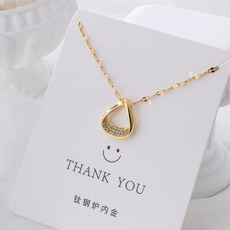 Versatile Luxury Titanium Steel Necklace with a Colorfast Pendant - Simple Niche Design Clavicle Chain for Women.