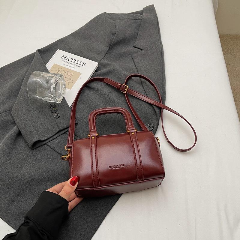 New niche popular simple solid color double pull portable shoulder messenger women's bag