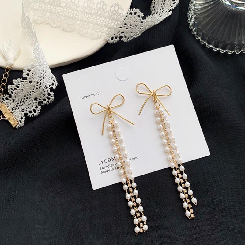 S silver needle Korean bow pearl long fringed stud earrings female face thin versatile earrings fresh lady style
