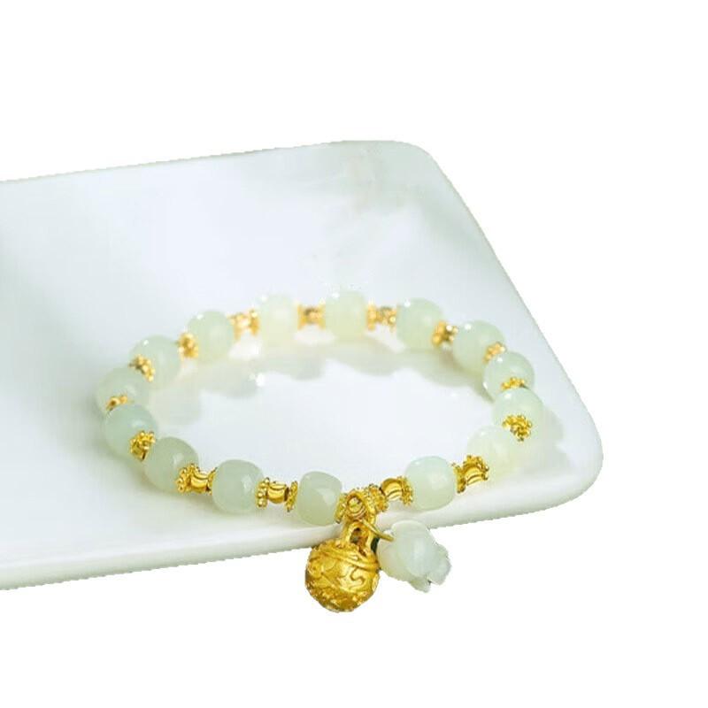 The world of beauty: Natural Hetian jade bracelet for women, new Chinese style shell lily of the valley traditional Chinese bracelet, light luxury