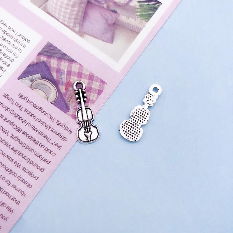 

Набор подвесок из смешанного сплава музыкальных инструментов: 51 Мини-подвеска в виде гитарной ноты