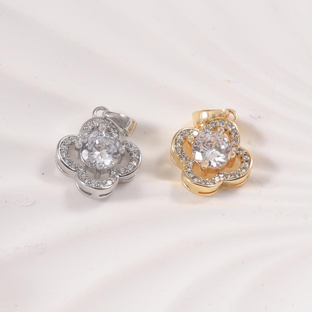 Two-Tone Four-Leaf Clover Diamond Halo Pendant Necklace in Gold and Silver - Women's Fashion Jewelry.