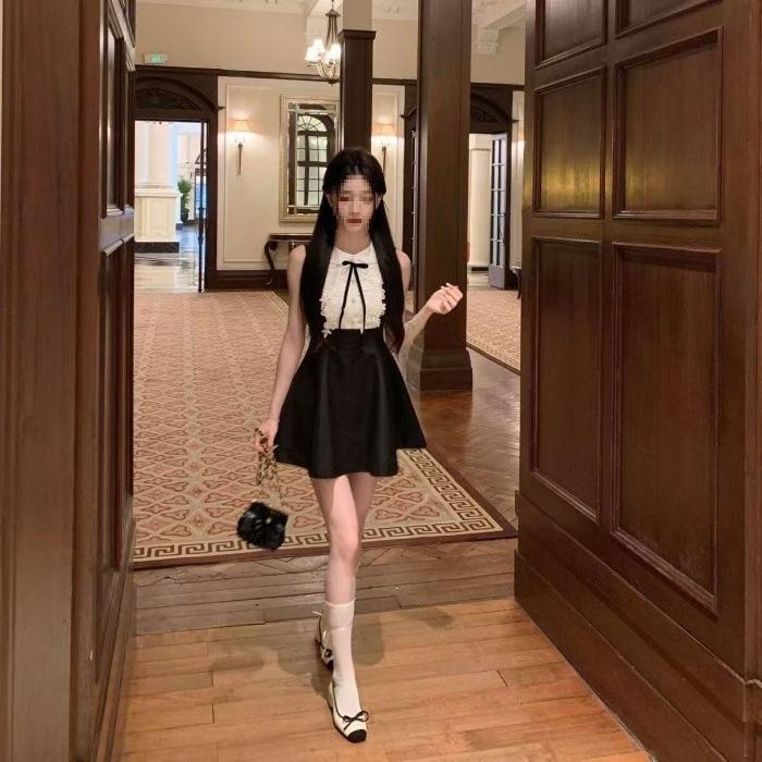 

Rich family daughter senior sense black sleeveless vest dress summer lace design sense waist a word puffy skirt. S