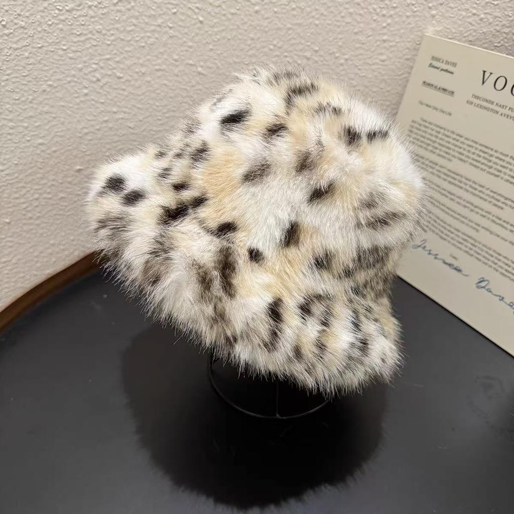 Autumn and winter thickened warm windproof ear protection show face leopard print plush bucket hat female