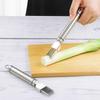 Multifunctional Stainless Steel Vegetable and Onion Slicer with Celery and Scallion Cutting Capabilities.