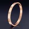 Braccialetto Unisex in Acciaio Titanio, Oro Rosa, Design a Chiodo, Durevole e Resistente allo Sbiadimento, Perfetto come Elegante Accessorio da Polso o Piccolo Regalo per le Feste.