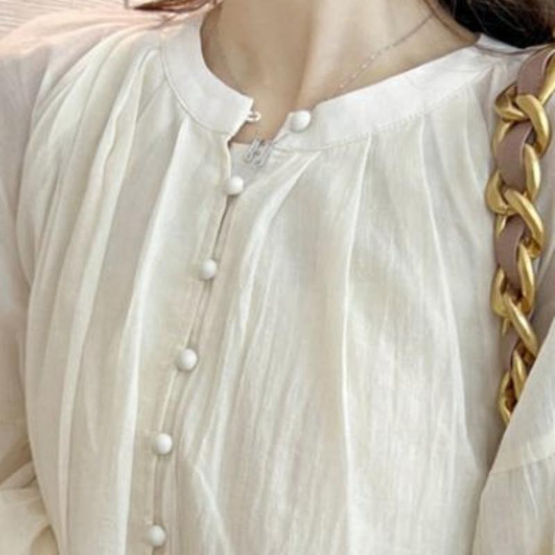 Spring and Summer New Simplicity Solid Color Trend Splicing Buttons Fashion Commuting Versatile Round Neck Long Sleeved Shirt