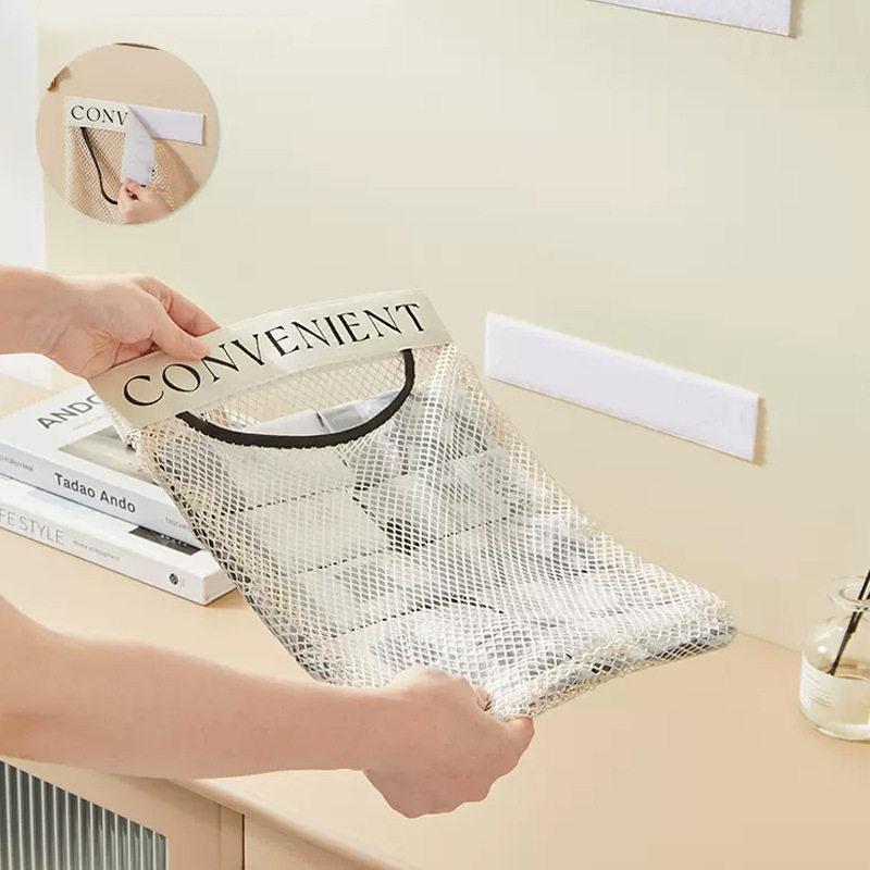 Cream-Colored Wall-Mounted Mesh Bag: Large Capacity Kitchen Storage with Velcro.