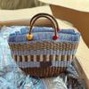 2023 Handmade Woven Straw Bucket Bag: Cute Picnic Basket with Tassel and Wood Bead Decoration