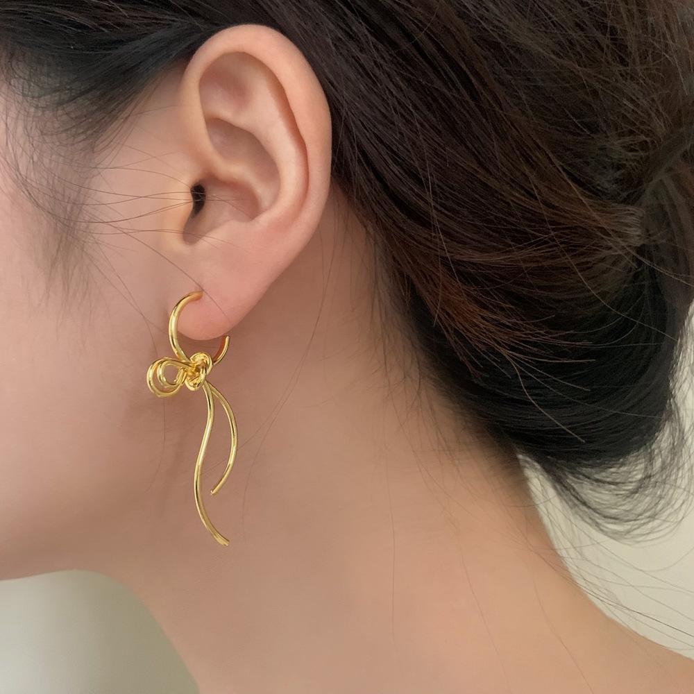 Trendy European & American Bow Pendant Stud Earrings with Tassels