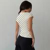 Nuova maglietta estiva a pois off-shoulder aderente a maniche corte, stile europeo e americano, top versatile per la moda femminile