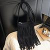 Oblique span tassel bag women's new fashion retro travel versatile bucket bag