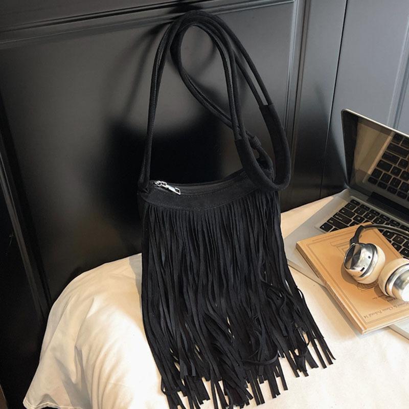 Oblique span tassel bag women's new fashion retro travel versatile bucket bag