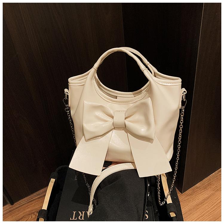 

Large capacity bag women s summer 2025 new trendy niche messenger bag women s Korean version portable bow bucket bag