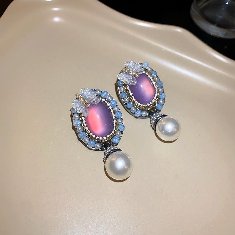 Silver needle oval butterfly pearl earrings niche retro court style stud earrings high sense temperament versatile earrings