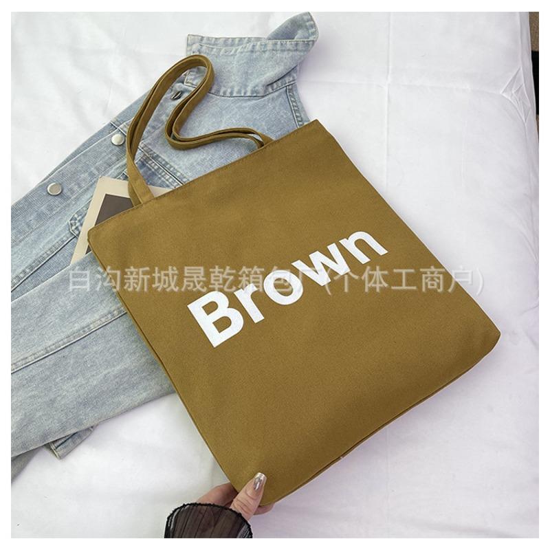 

New autumn simple literary large-capacity canvas bag female students commute to class portable shoulder bag