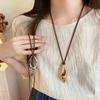 Retro High-End Leather and Metal Conch Necklace - Stylish Clavicle Chain for Women