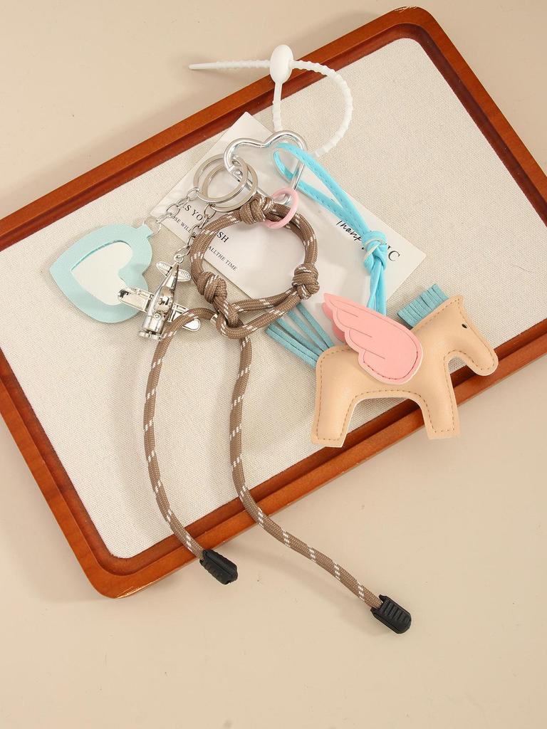 Portachiavi Miu in Pelle Pegaso con Cordoncino e Charm