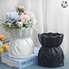 Nordic Ceramic Hydroponic Vase with Artificial Flowers - Black & White Ornament for Living Room Decor.