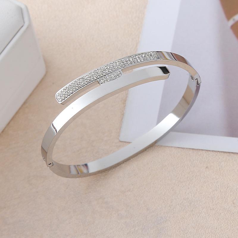 Asymmetrical Rhinestone Inlaid Titanium Steel Bracelet - European & American High-End Women s Jewelry