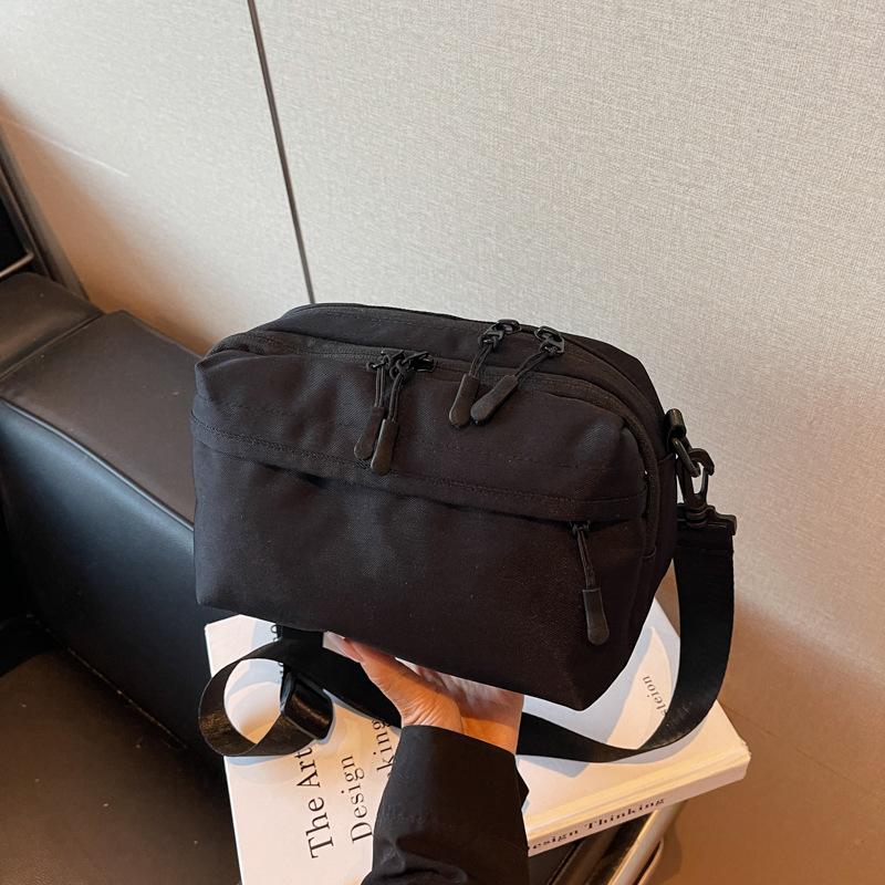 

Niche design simple and lightweight outdoor leisure small square bag women s new versatile single shoulder messenger bag hand чёрный