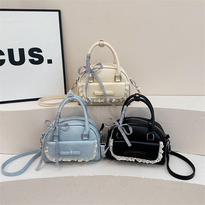 New small bag women's summer new fashion niche design messenger bag portable bowling bag
