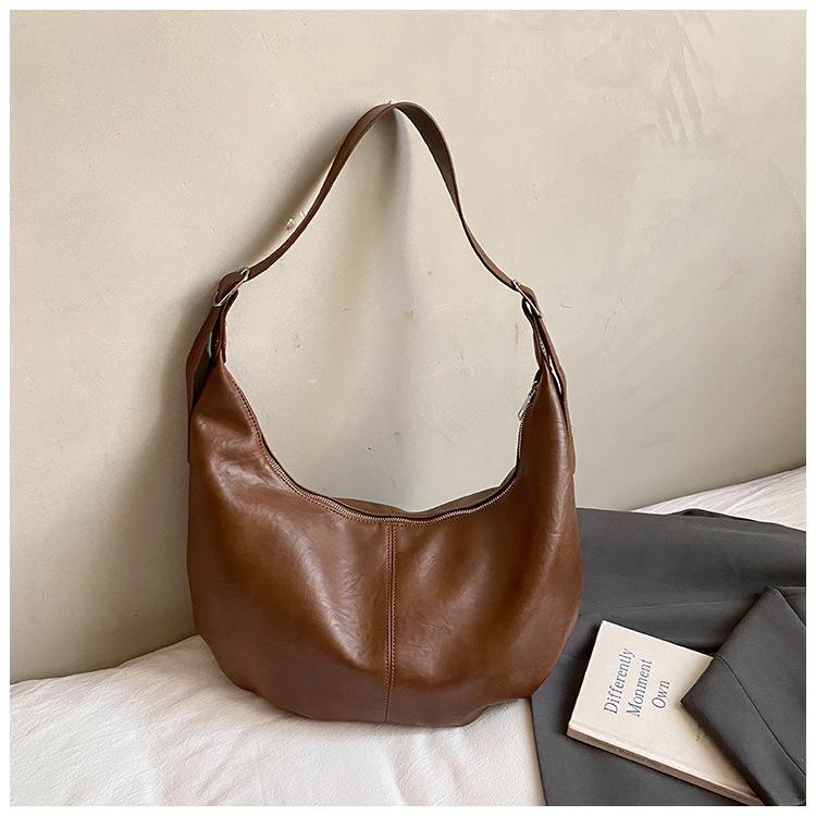 

Retro niche design croissant women s bag 2025 new trendy Korean version ins fashion one shoulder messenger bag dumpling bag коричневий