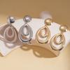 Metal-sensitive glossy geometric hollow water drop silver needle earrings simple earrings