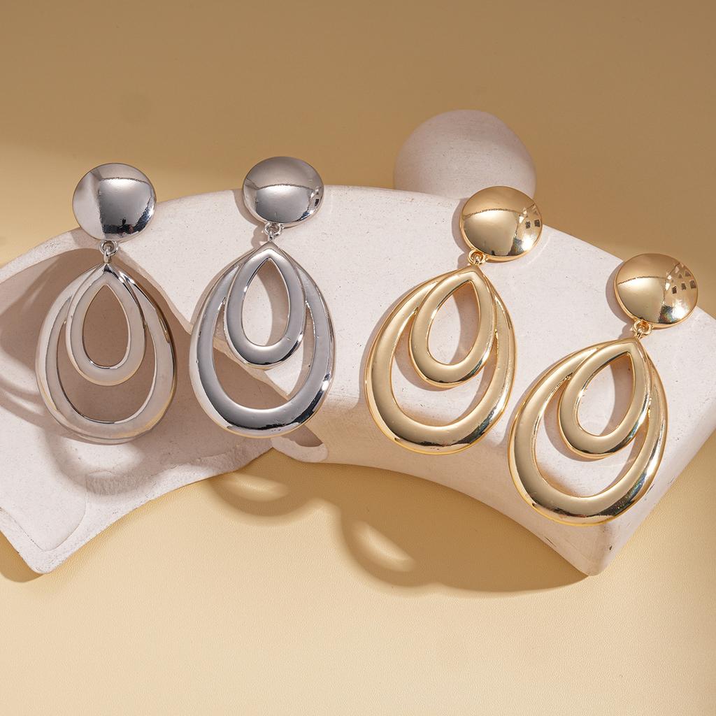 Metal-sensitive glossy geometric hollow water drop silver needle earrings simple earrings