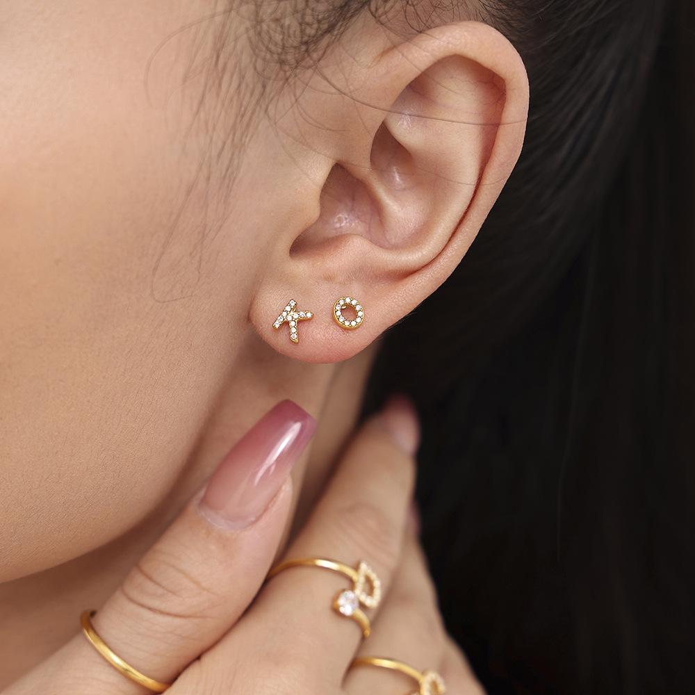 Oumeika Titanium Steel Jewelry Set: 26 Zircon-Inlaid Letters, PVD Gold-Plated Necklace, Bracelet, Earrings, and Ring.
