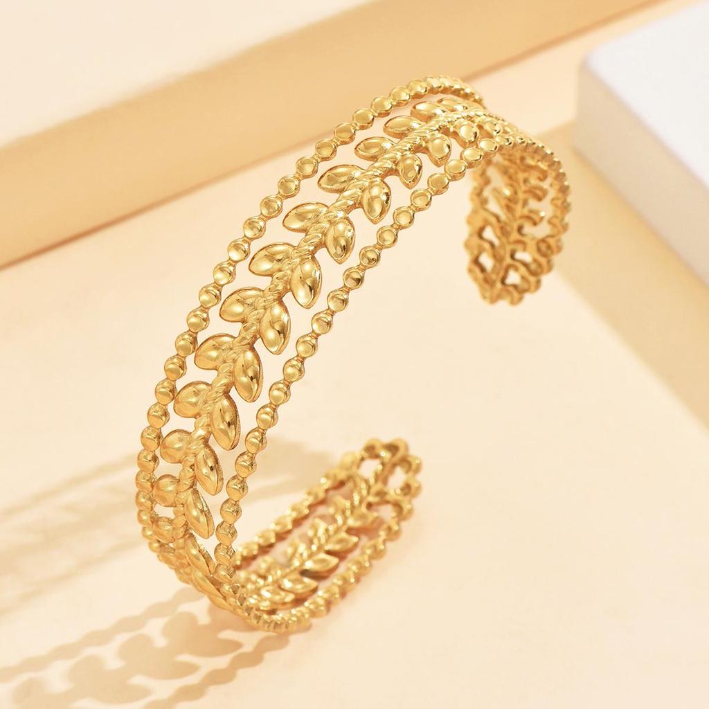 Elegant Hollow Leaf Open Stainless Steel Women's Bracelet with 18K Gold Vacuum Plating