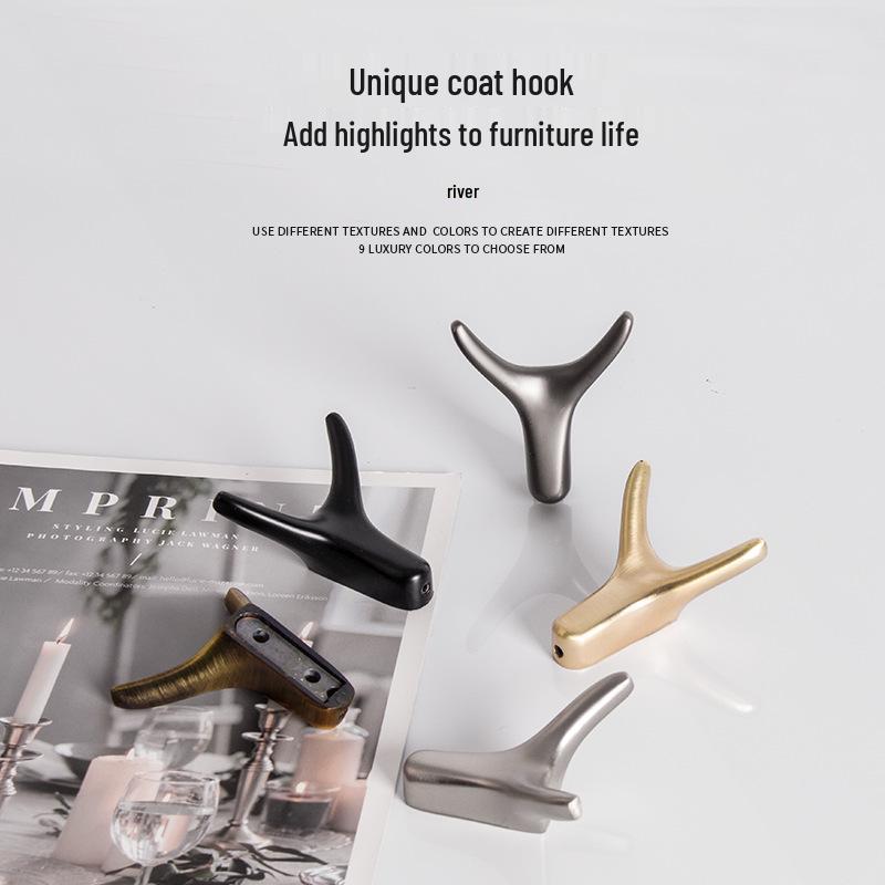 Nordic Creative Zinc Alloy Ox Horn Wall-Mounted Coat Hook for Bathroom, Kitchen, or Entryway.