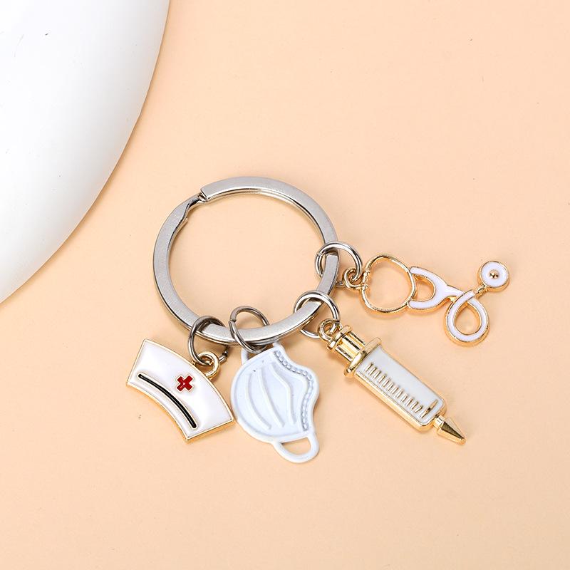 

Медицинский брелок: Аксессуары парамедика, Подарок студенту, Подвеска-шарм для сумки