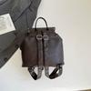Studded Leather Backpack Women's Fashionable Vintage Style Bag with Adjustable Straps and Multiple Pockets
