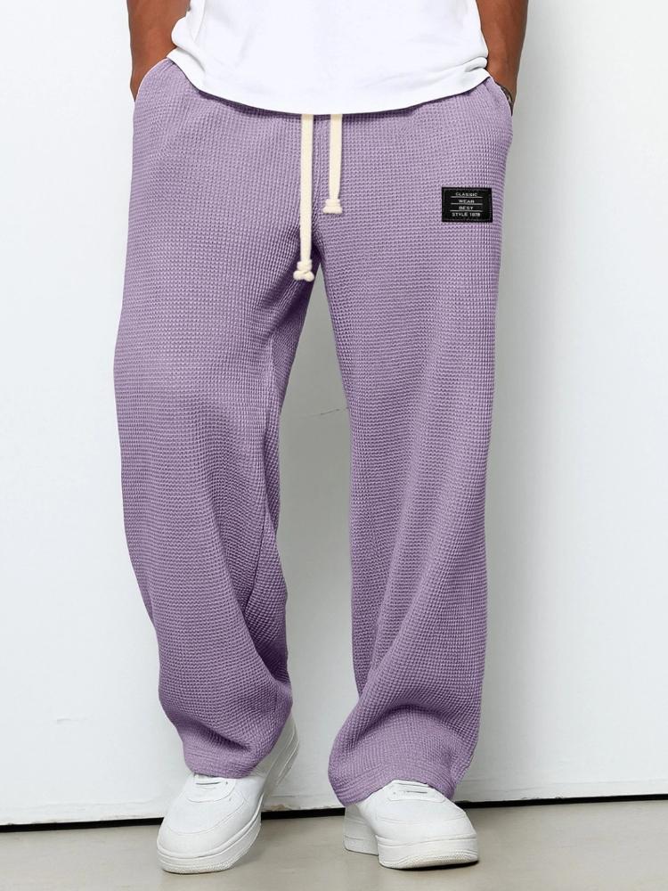Pantaloni della tuta casual sportivi a gamba dritta in maglia waffle con elastico e coulisse a vita media
