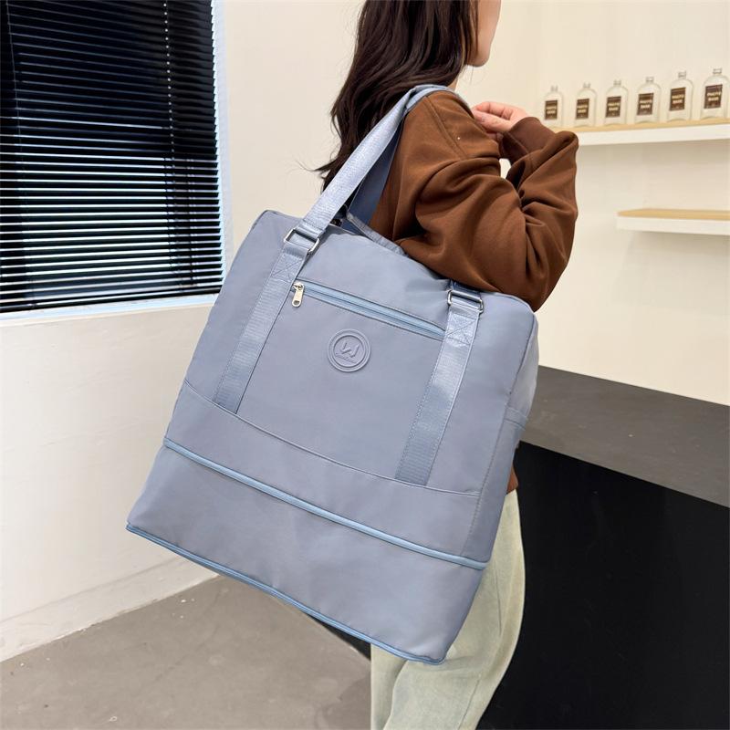 New short travel bag for men and women, large capacity fashion shoulder bag, convenient and versatile handbag, waterproof storage bag