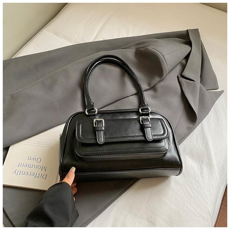 Eine modische, schlichte und elegante, Nischen-Casual-Einzelschultertasche für Damen, eine koreanische Version der beliebten Pillow Bag