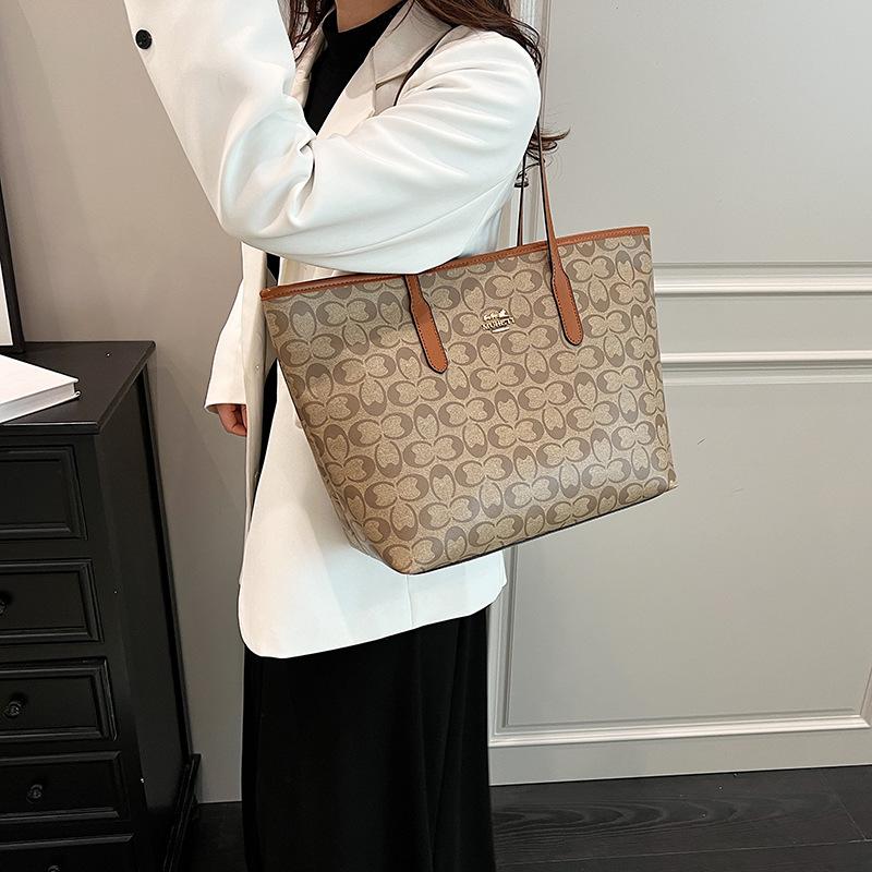 Bolso de gran capacidad para mujer 2026 nuevo bolso de hombro de moda sensación casual bolso tote para el trabajo y el transporte diario